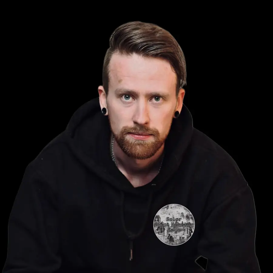 Kim of Solør Ghost Hunting Crew, portrait against a black background